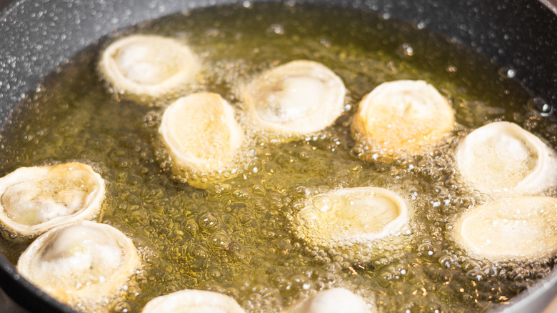 wontons frying in pan 