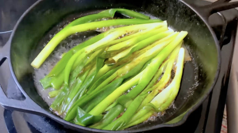 sauteed scallions in skillet