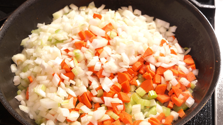 sautéing onion, carrots and celery