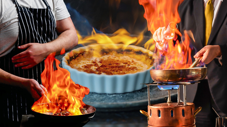 assorted flambéed dishes aflame