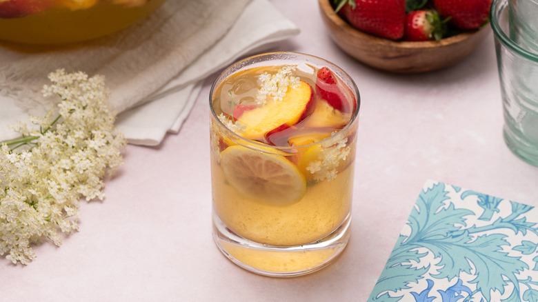 elderflower peach summer punch serving