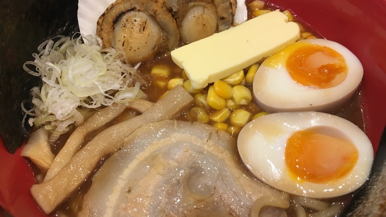 ramen bowl with brie topping