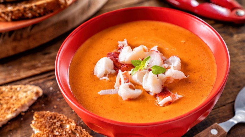 bowl of pumpkin soup with lobster
