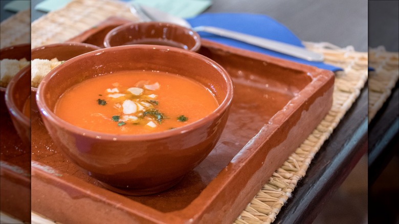 bowl of tomato soul with almonds