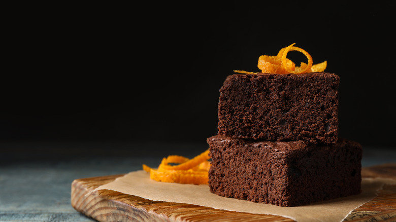 Homemade brownies decorated with orange peels