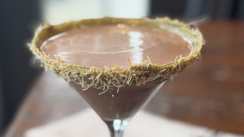 cocktail drink garnished with kataifi