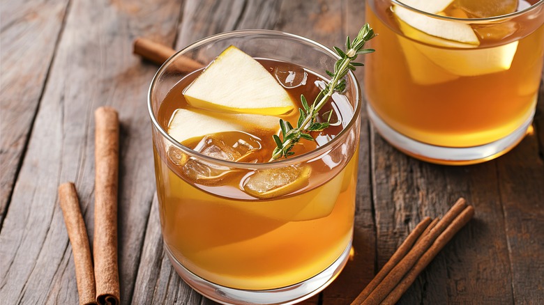 Apple cider cocktail with cinnamon and thyme