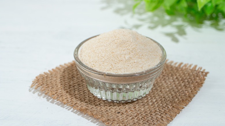 Small bowl of cane sugar.