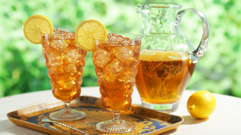 Cold steeped iced tea in glasses and pitcher