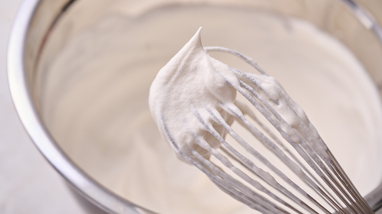 whipped cream on whisk