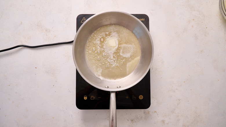 melting butter in skillet