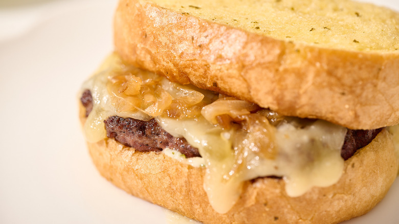 close up of caramelized onions on melt