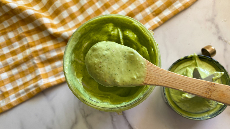 green dressing in small blender