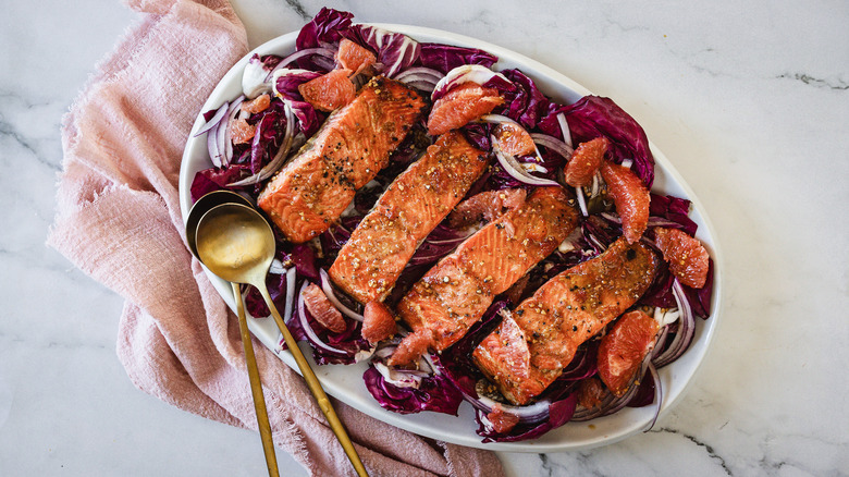 grapefruit salmon salad with pink napkin