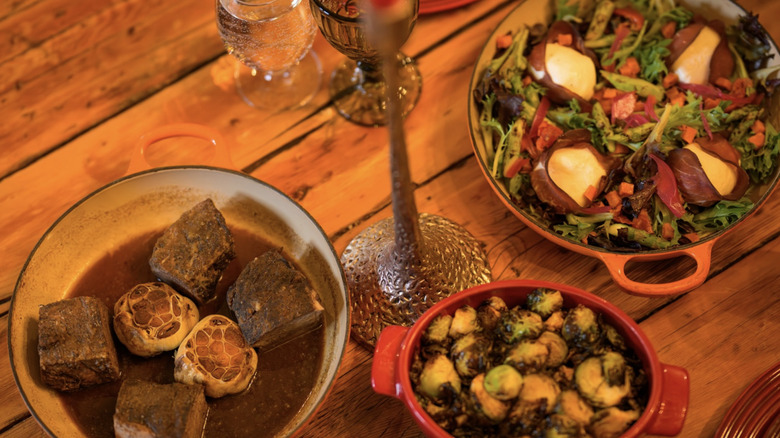 A selection of dishes on the table in one of the Hobbit Houses