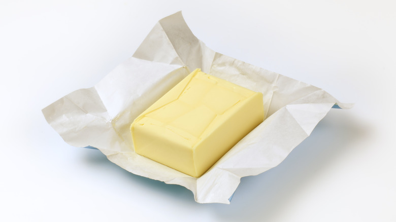 Stick of butter on a wrapper