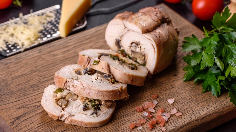 Turkey roulade on wooden board