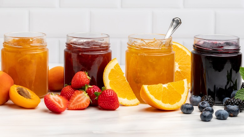 various fruit jam jars