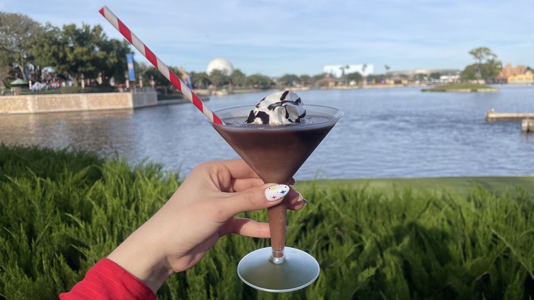 Brown drink with striped straw