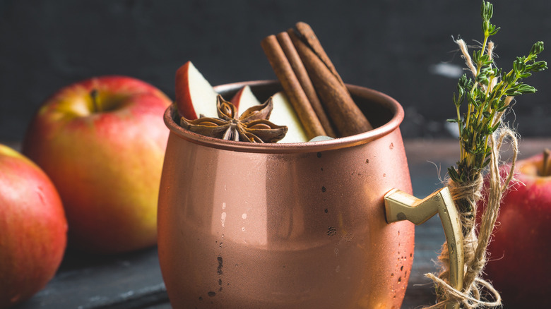 Cinnamon stick in copper cup