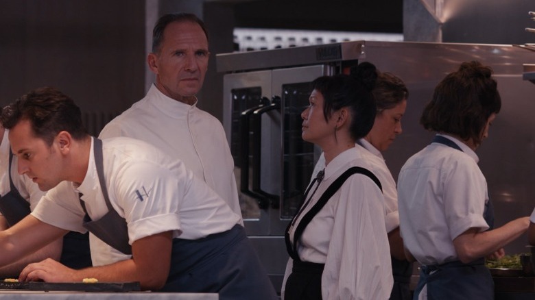 Ralph Fiennes and Hong Chau in the kitchen in The Menu