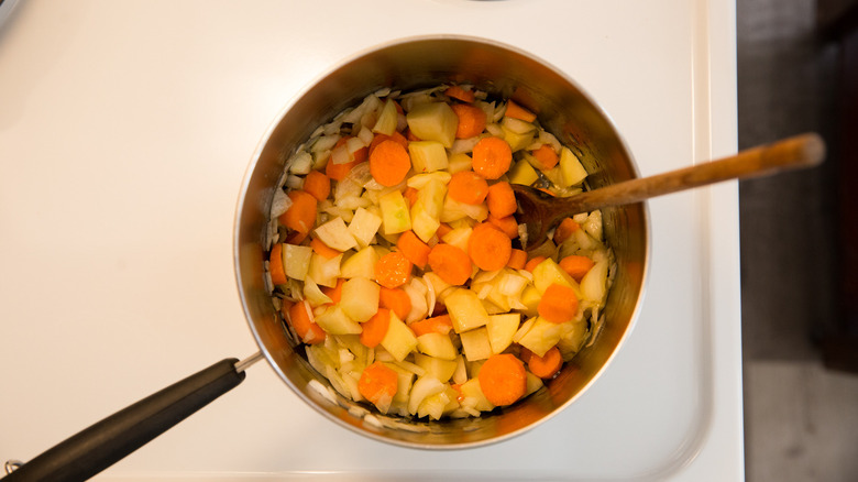 vegetables cooking in saucepan