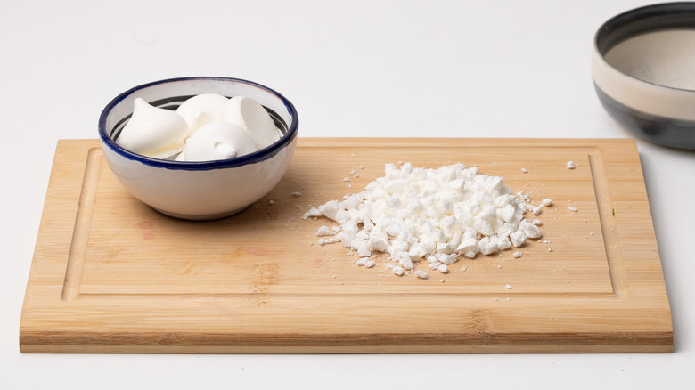 crumbed meringue on chopping board