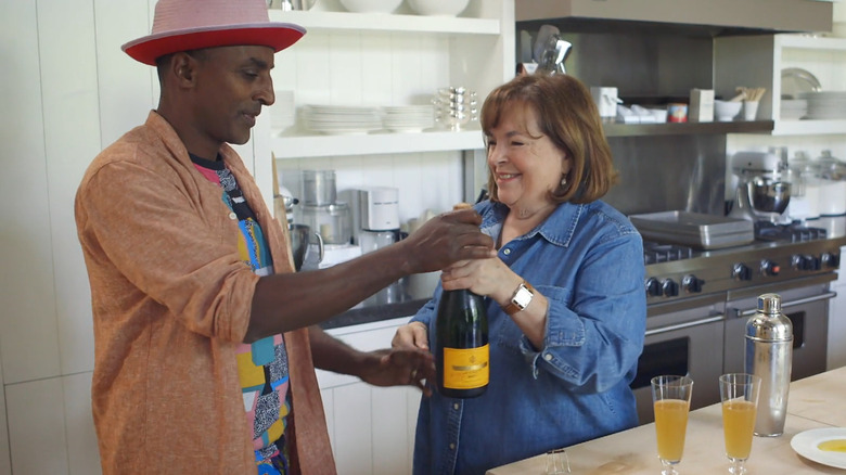 Marcus Samuelsson and Ina Garten with champagne