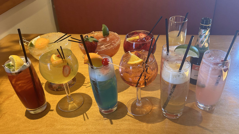 Olive Garden cocktails arranged on wooden table