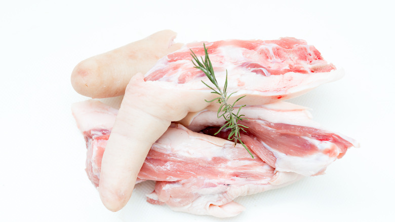 raw pork tails with rosemary