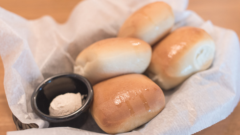 Basket of Texas Roadhouse rolls and butter