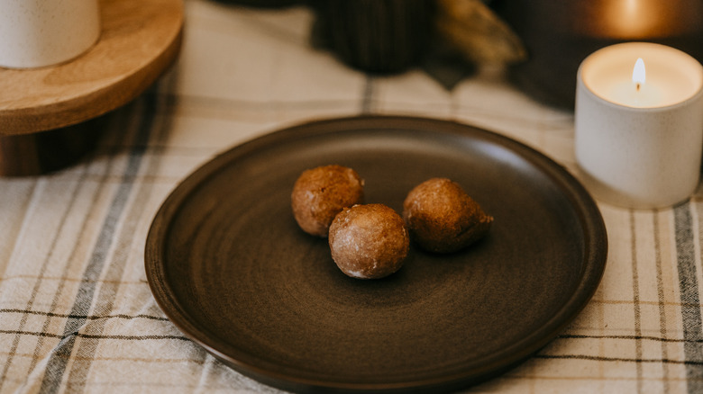 Three Dunkin' Pumpkin Munchkins