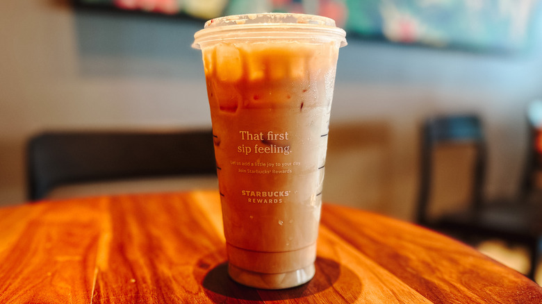 Iced Starbucks drink on table