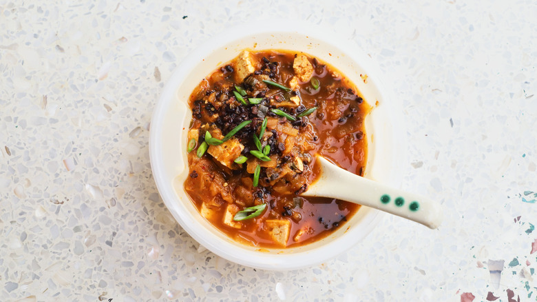 Plastic bowl of kimchi soup 