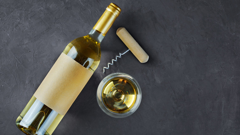 Flat lay white wine bottle