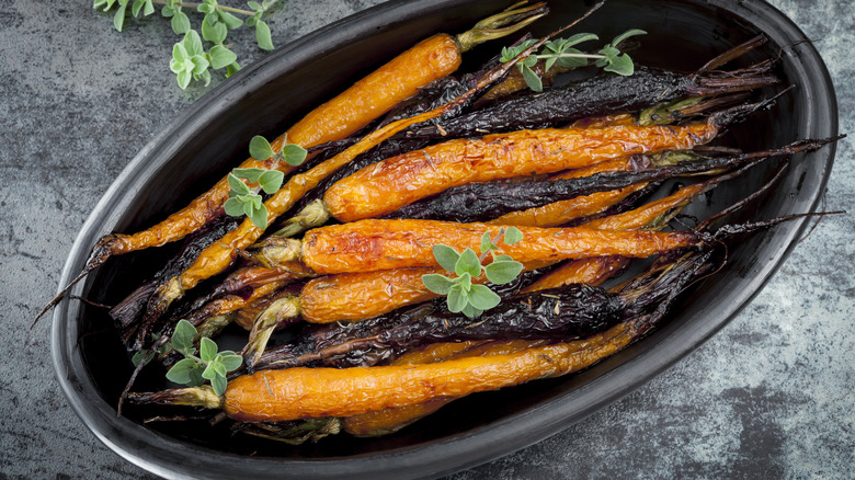 Oven-roasted carrots in dish