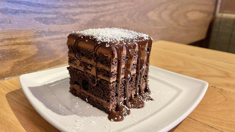 A slice of Olive Garden Chocolate Lasagna dessert on a white plate