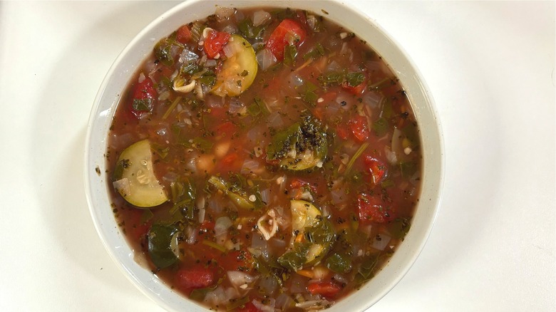 Bowl of Olive Garden Minestrone soup on white table