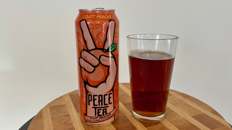 Can and glass of Just Peachy iced tea