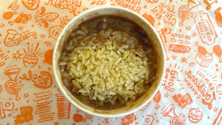 Overhead shot of Popeyes red beans and rice on Popeyes wrapper