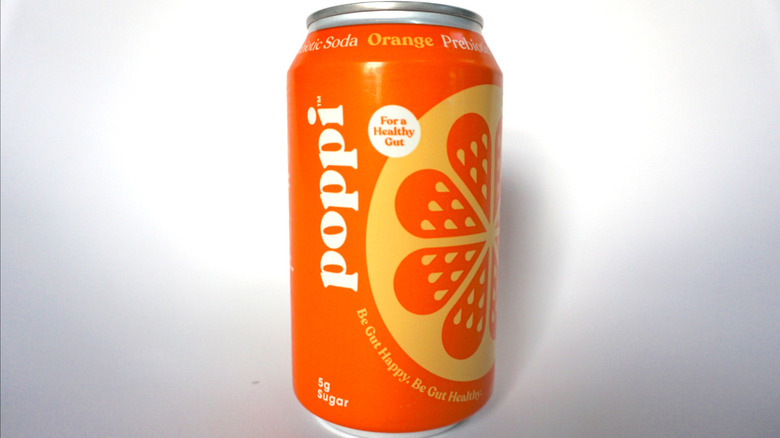 Orange Poppi soda can