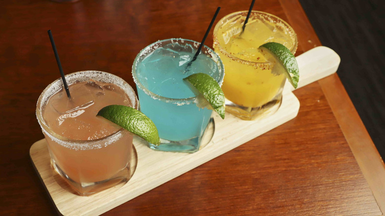 A trio of salt-rimmed margaritas