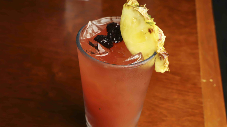 Pint glass with tropical garnish