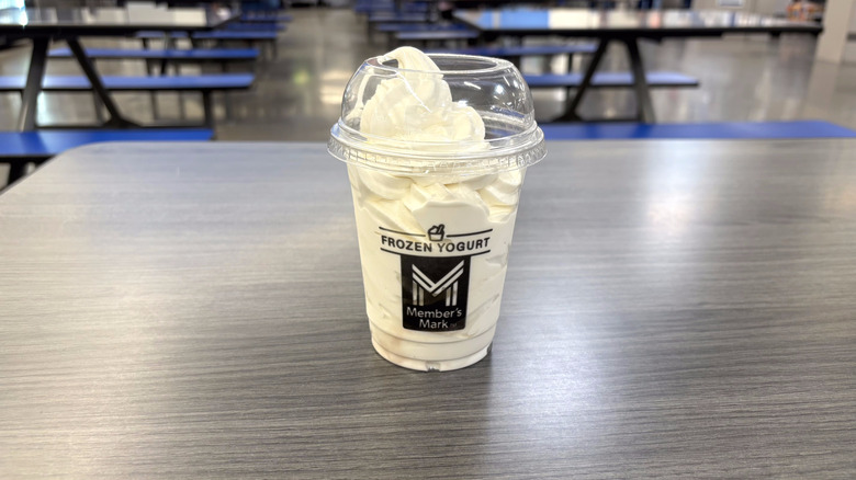 Sam's Club vanilla frozen yogurt in plastic cup on table in food court
