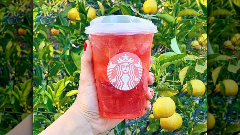 Person holding Strawberry Acai Lemonade