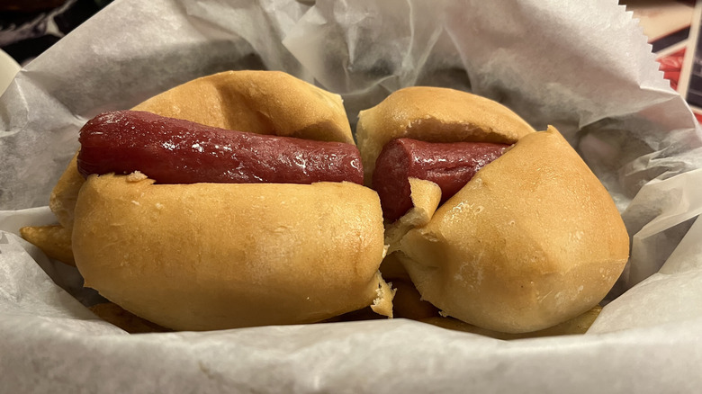 hot dog on a bun on wax paper