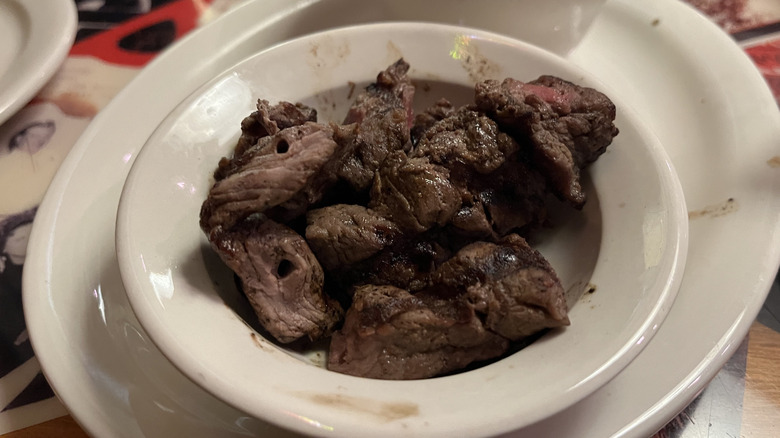 Lil' Dillo steak bites on a white plate