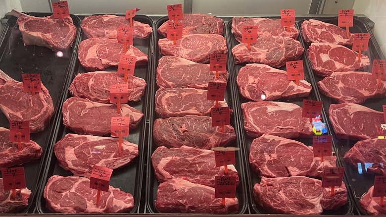pieces of steak in a display window