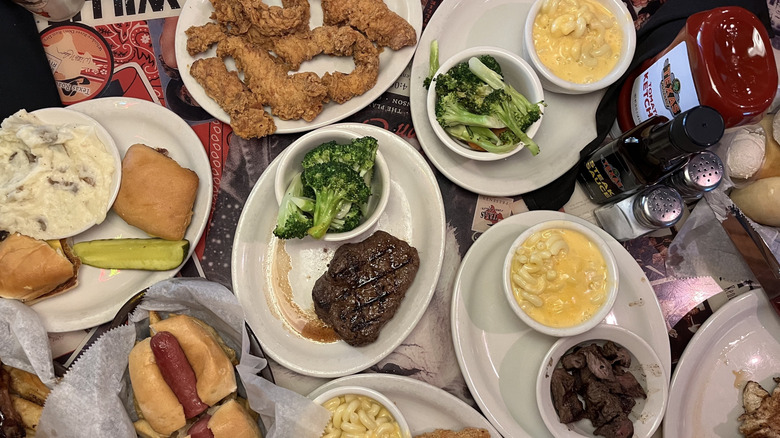 View of broccoli and other food dishes at Texas Roadhouse