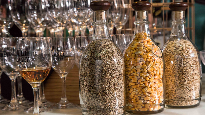 rye corn and barley in bottles